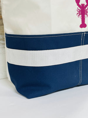 
            
                Load image into Gallery viewer, The Hull Embroidered Pink Lobster Large Recycled Sailcloth Beach Bag
            
        
