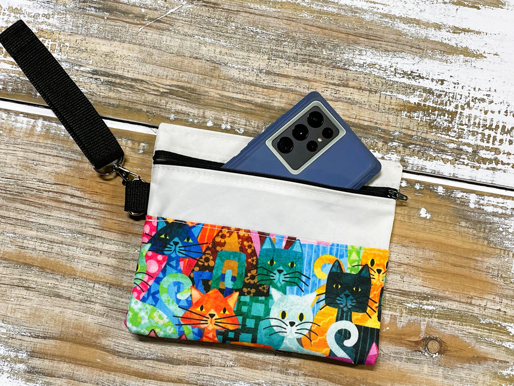 
            
                Load image into Gallery viewer, Colorful Cats Wristlet
            
        