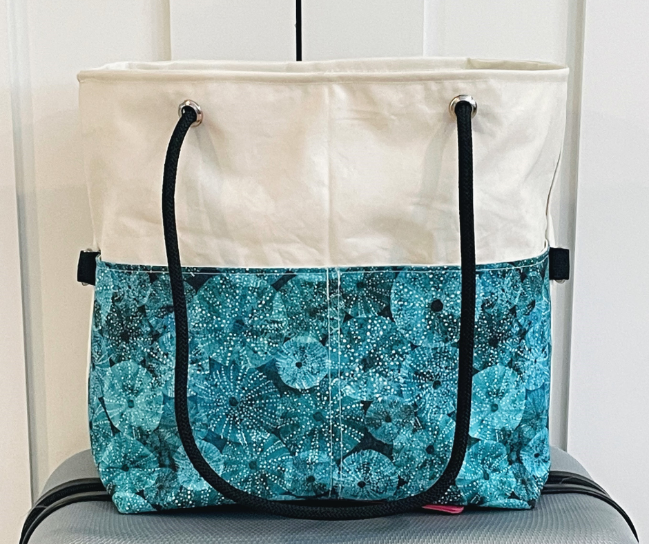 
            
                Load image into Gallery viewer, Recycled Sailcloth Green Sea Urchin Travel Bag with Trolley Sleeve
            
        