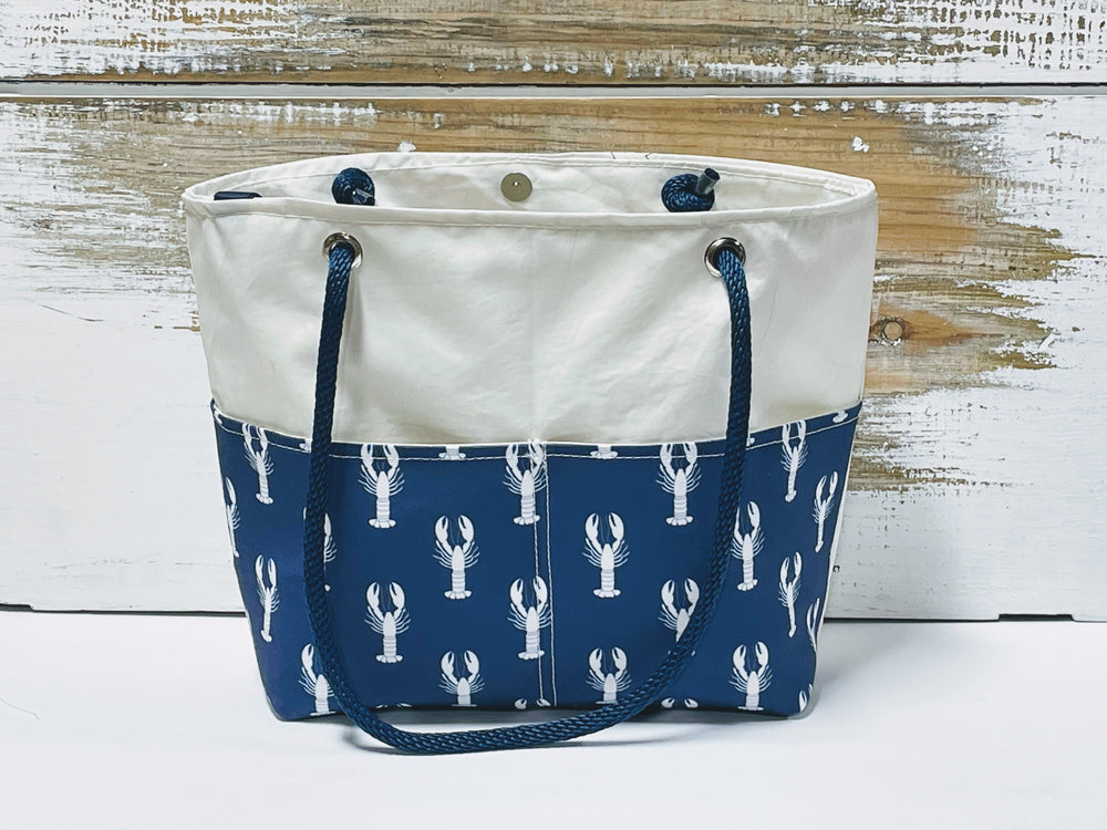 
            
                Load image into Gallery viewer, Main Sail White Lobster Recycled Sail Tote Bag
            
        